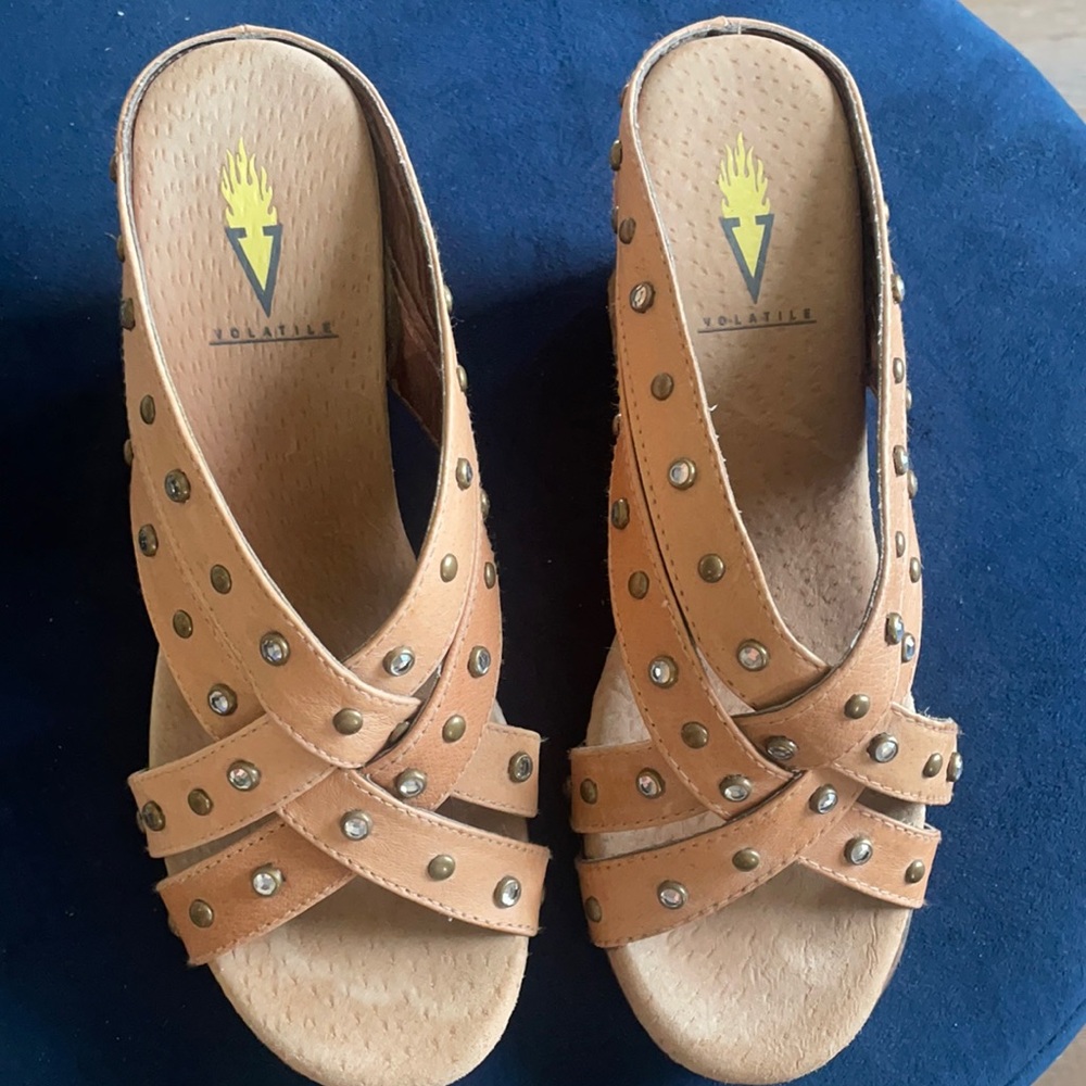 Volatile wedge shoes. Tan in color. Size 8